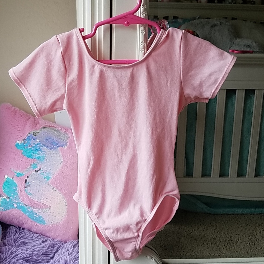 Girls dance Leo in classic pink